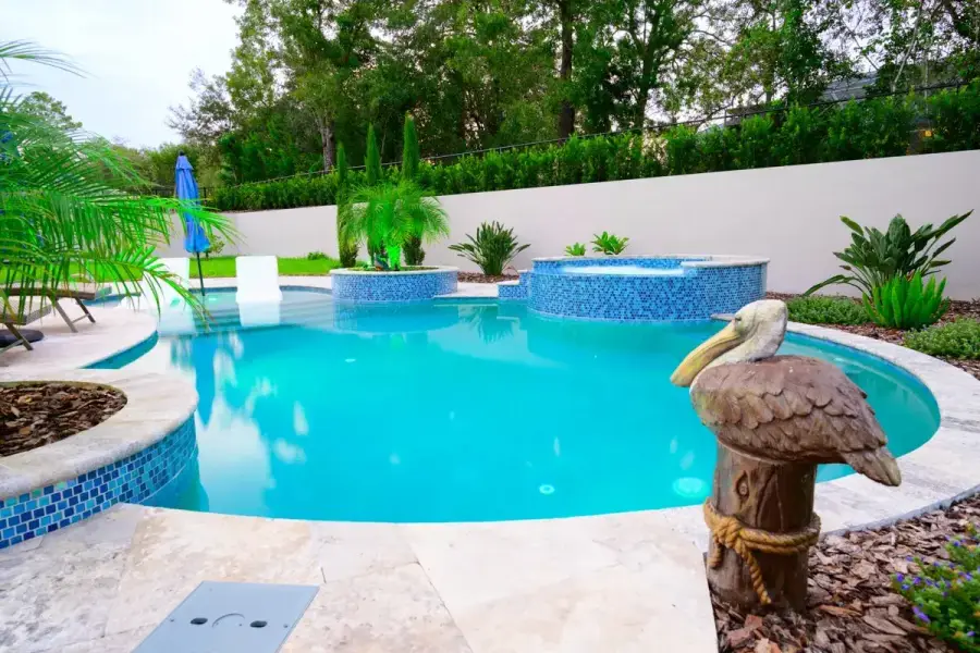 Serene Weeki Wachee backyard pool with lush greenery